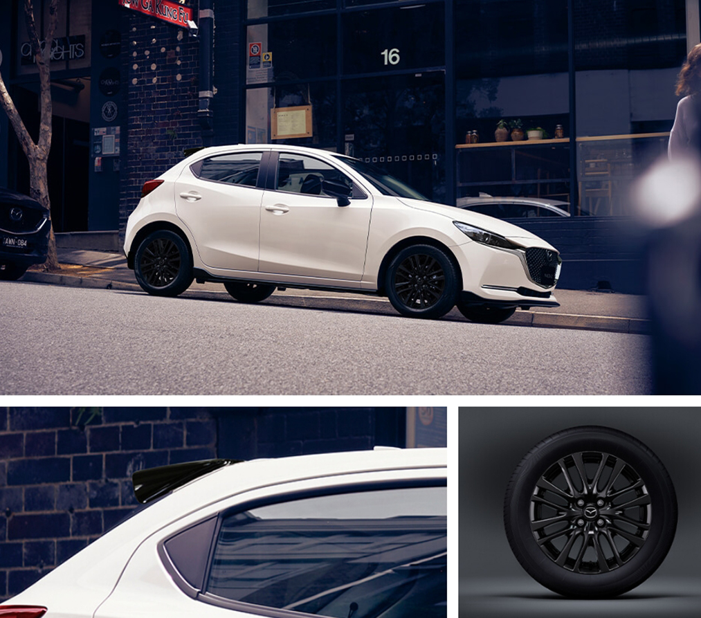 Mazda2 in Purweiss mit 16-Zoll Leichtmetallfelgen und schwarzem Spoiler