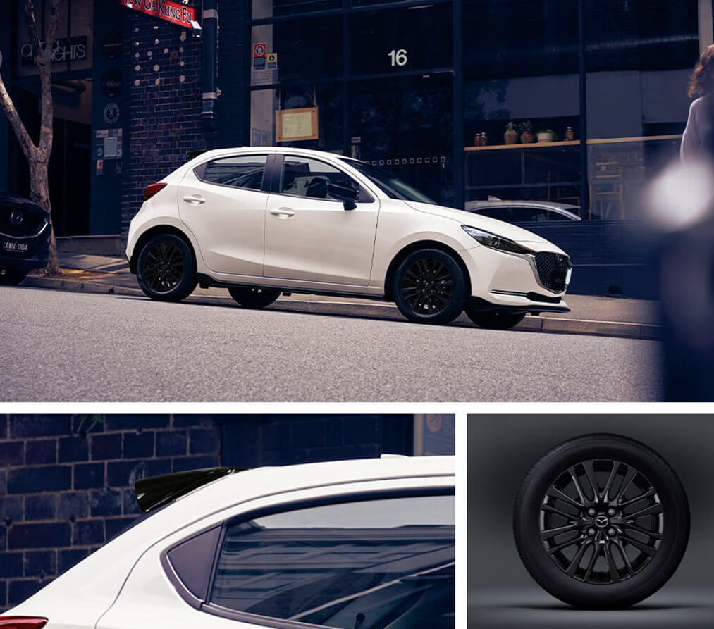 Mazda2 i färgen Arctic White 16" svarta lättmetallfälgar och svart takspoiler