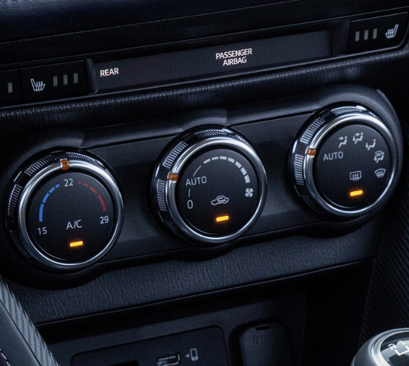 The round control dials of Mazda’s automatic air conditioning system.