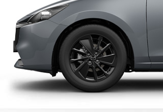 The 16” Alloy wheel Black of the Mazda2 in the Homura grade