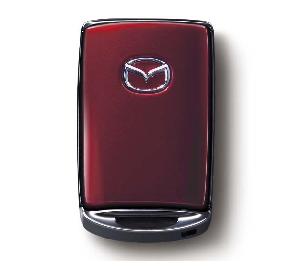 Colored key shells for the remote key painted in the actual red body colours of the Mazda2.