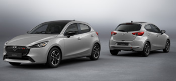 Two Mazda2 parked next to each other,  shown from the front and rear.