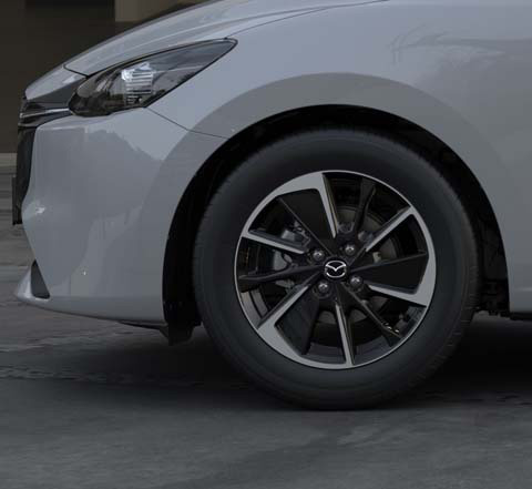 Profile view of the 2023 Mazda2 with new alloy wheels.