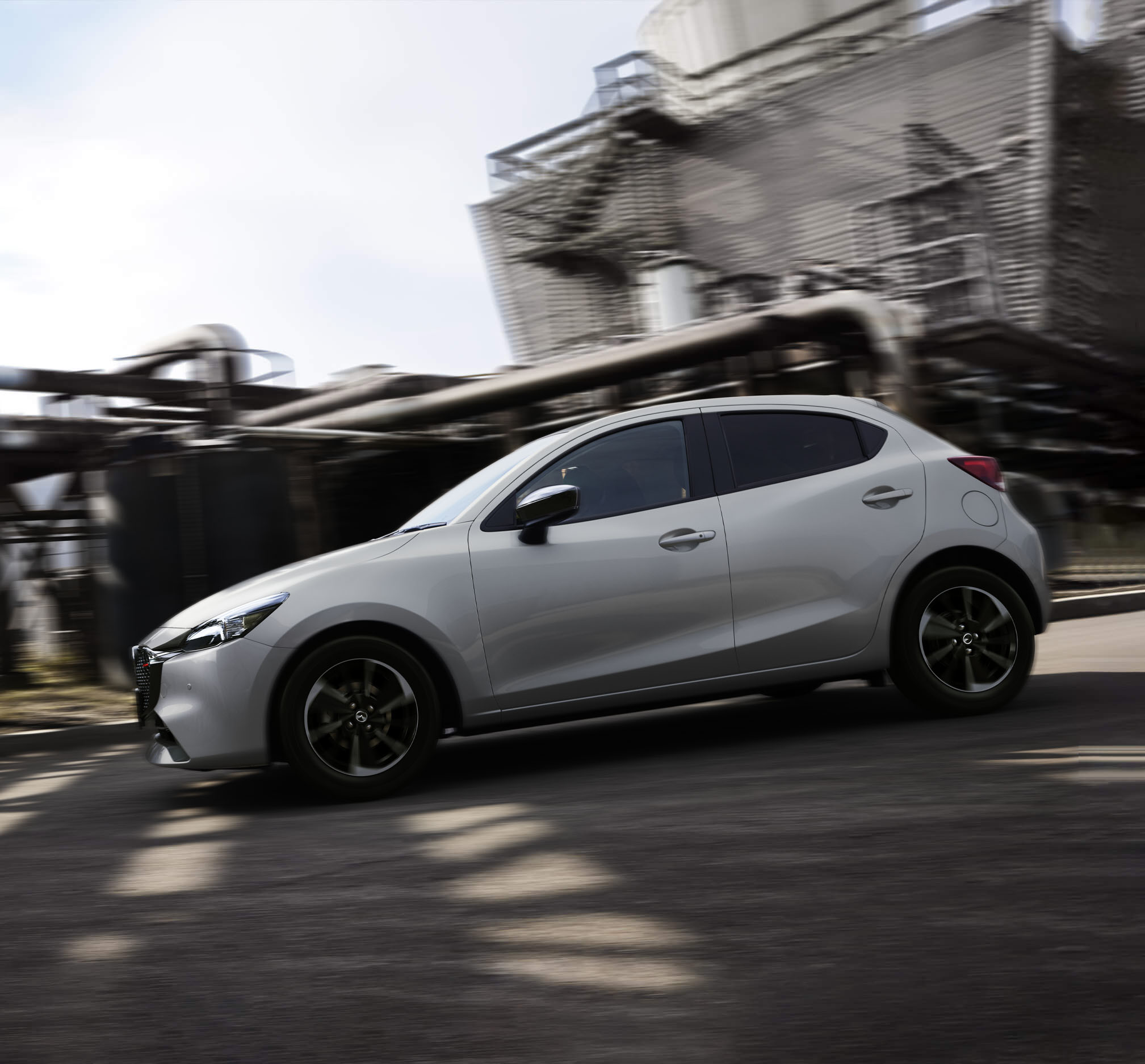 The beautiful proportions of the Mazda2 in profile.