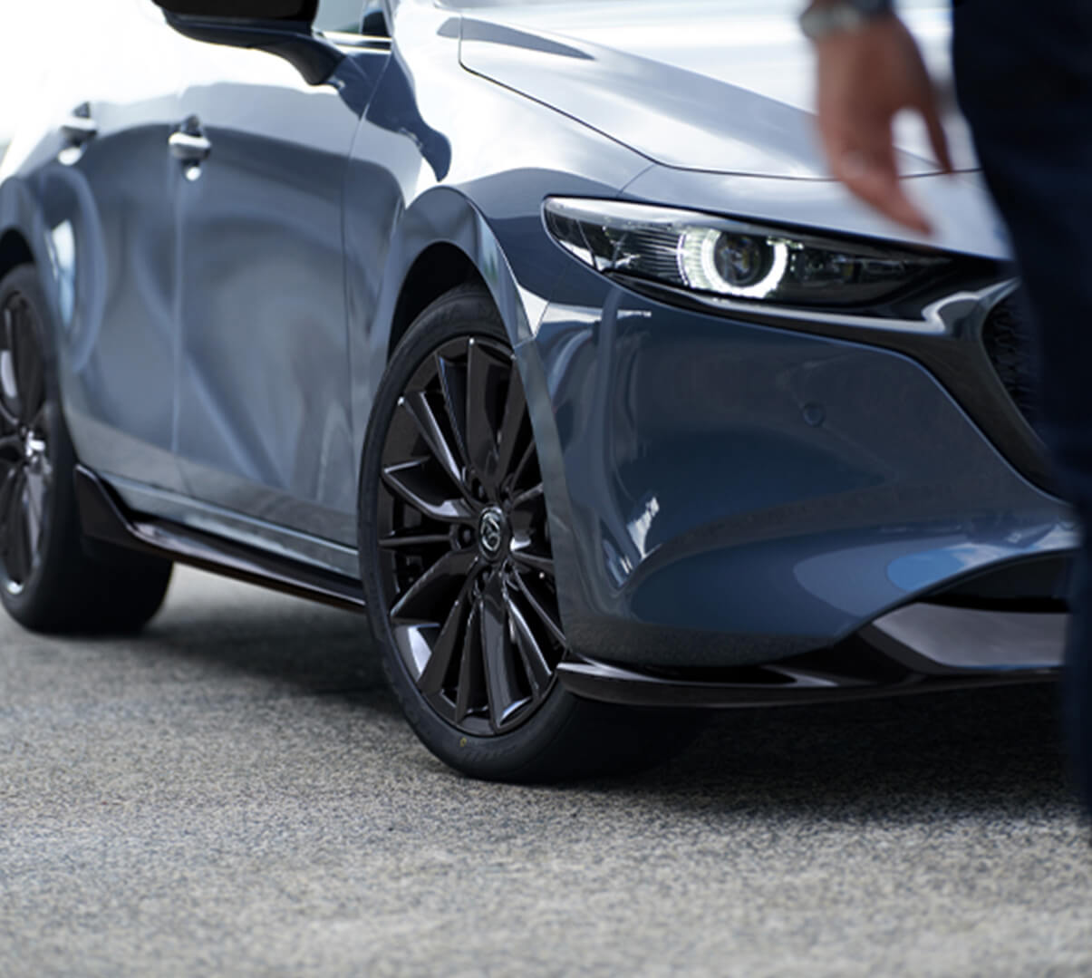 The aero-design front bumper fairing and side skirt kit of the Mazda3.