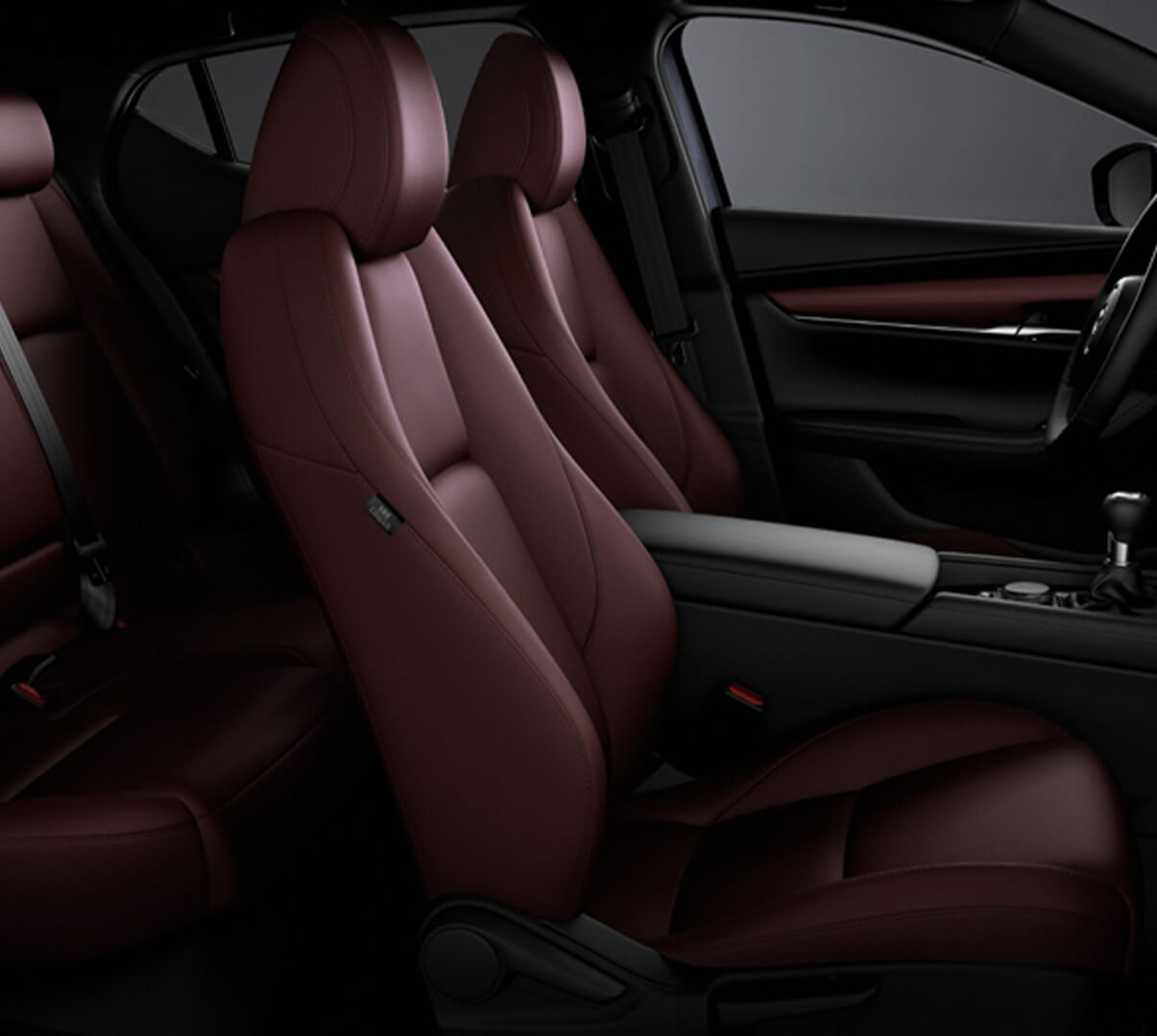The four leather seats inside the Mazda3.