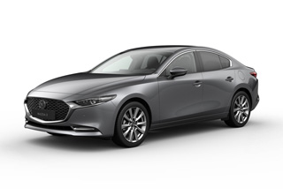 Mazda3 Седан в цвят на купето Machine Grey при ниво на оборудване Exclusive-Line.