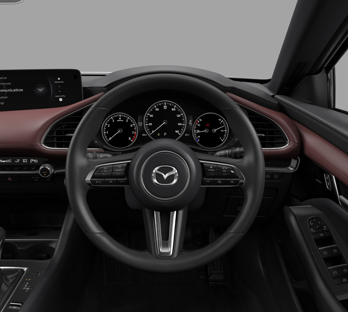 A close up of the steering wheel of the Madza 3 with all its beautiful details.