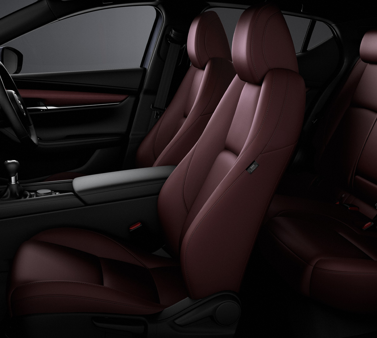 The four leather seats inside the Mazda3.