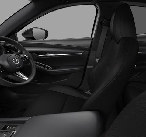 Black Cloth Seats, Dashboard, Armrest with Red Stitch of the Mazda3 hatchback