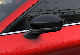 Galerie de toit en aluminium avec traverses noires sur la Mazda3 Hatchback avec niveau d’équipements Homura.