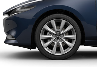 Jantes en alliage léger 18” en couleur argent sur la Mazda3 Sedan avec niveau de revêtement de siège Takumi