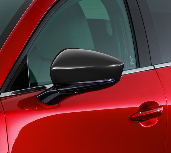 Black mirror covers for your Mazda CX-30 add a bit of two-tone flair. 