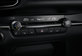 Dual A/C Auto with Rear Seat Air Vent Outlets in Mazda CX-30 Exclusive-Line equipment.