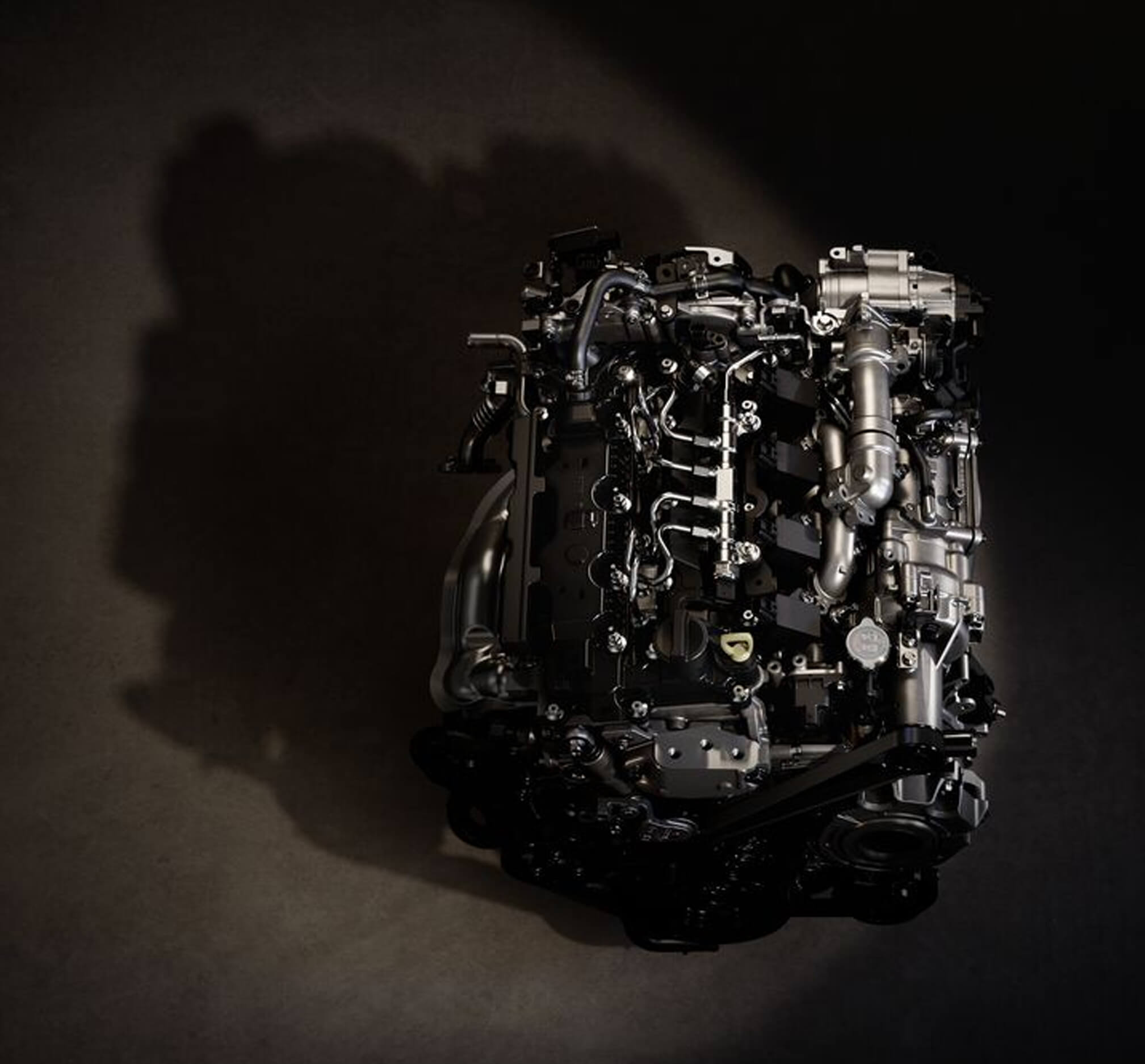 A close up image of the Madza CX-30’s Skyactiv-X engine.