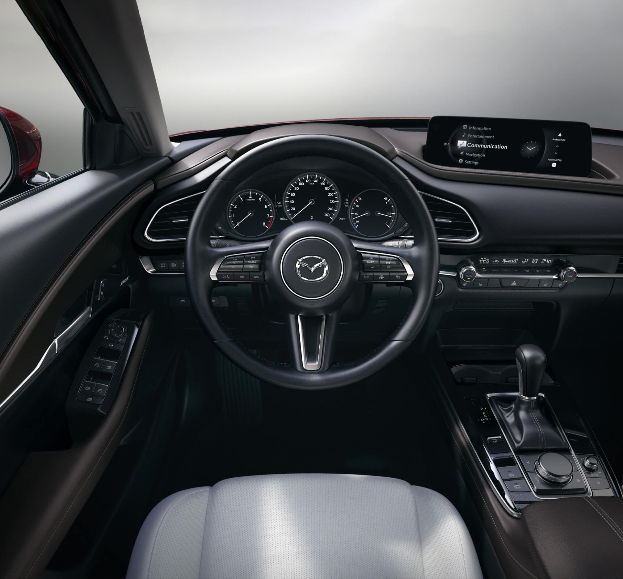 The steering wheel of the Madza CX-30 with all its beautiful details.