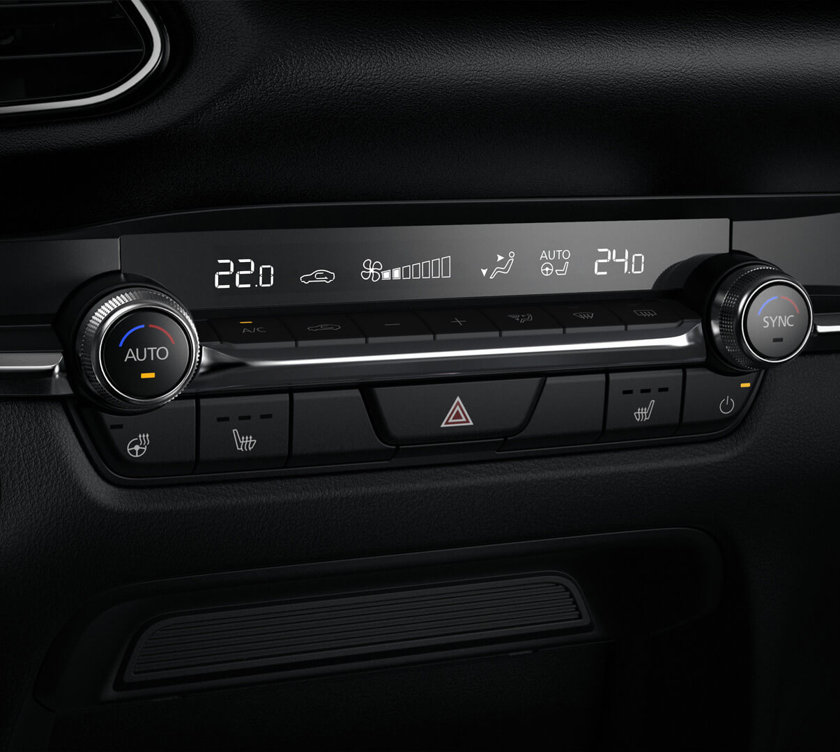 The round controls of the automatic air conditioning system of the Mazda CX-30.