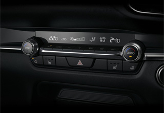 Dual A/C Auto with Rear Seat Air Vent Outlets in Mazda CX-30 Exclusive-Line equipment.