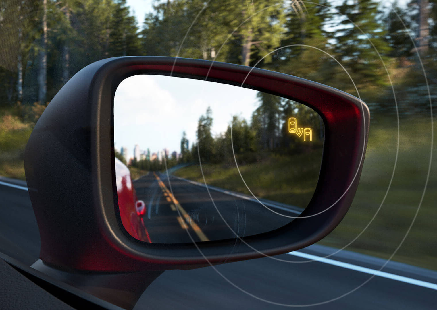 Mazda CX-30’s Blind Spot Monitoring alert in the side view mirror.