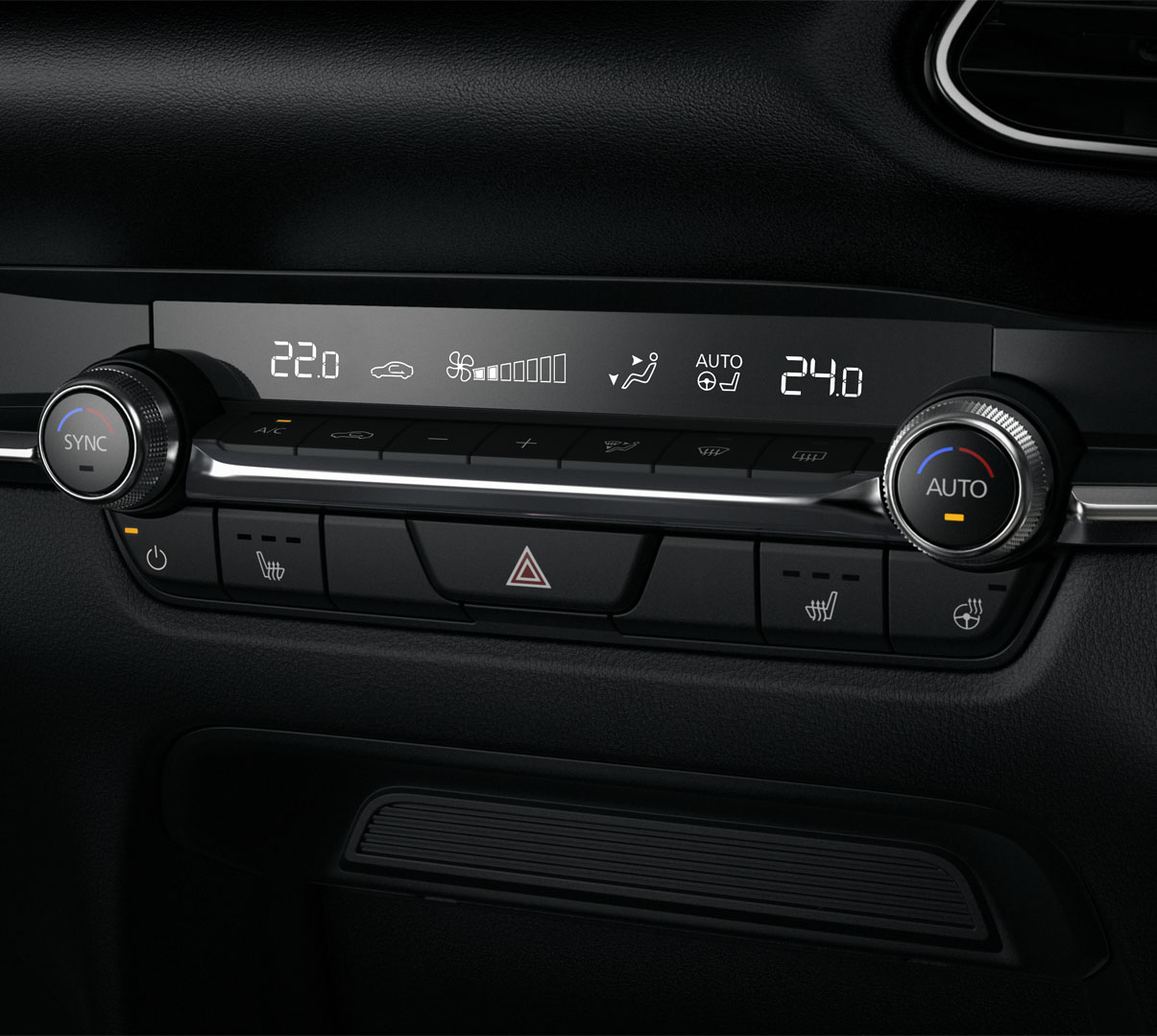 The round controls of the automatic air conditioning system of the Mazda CX-30.