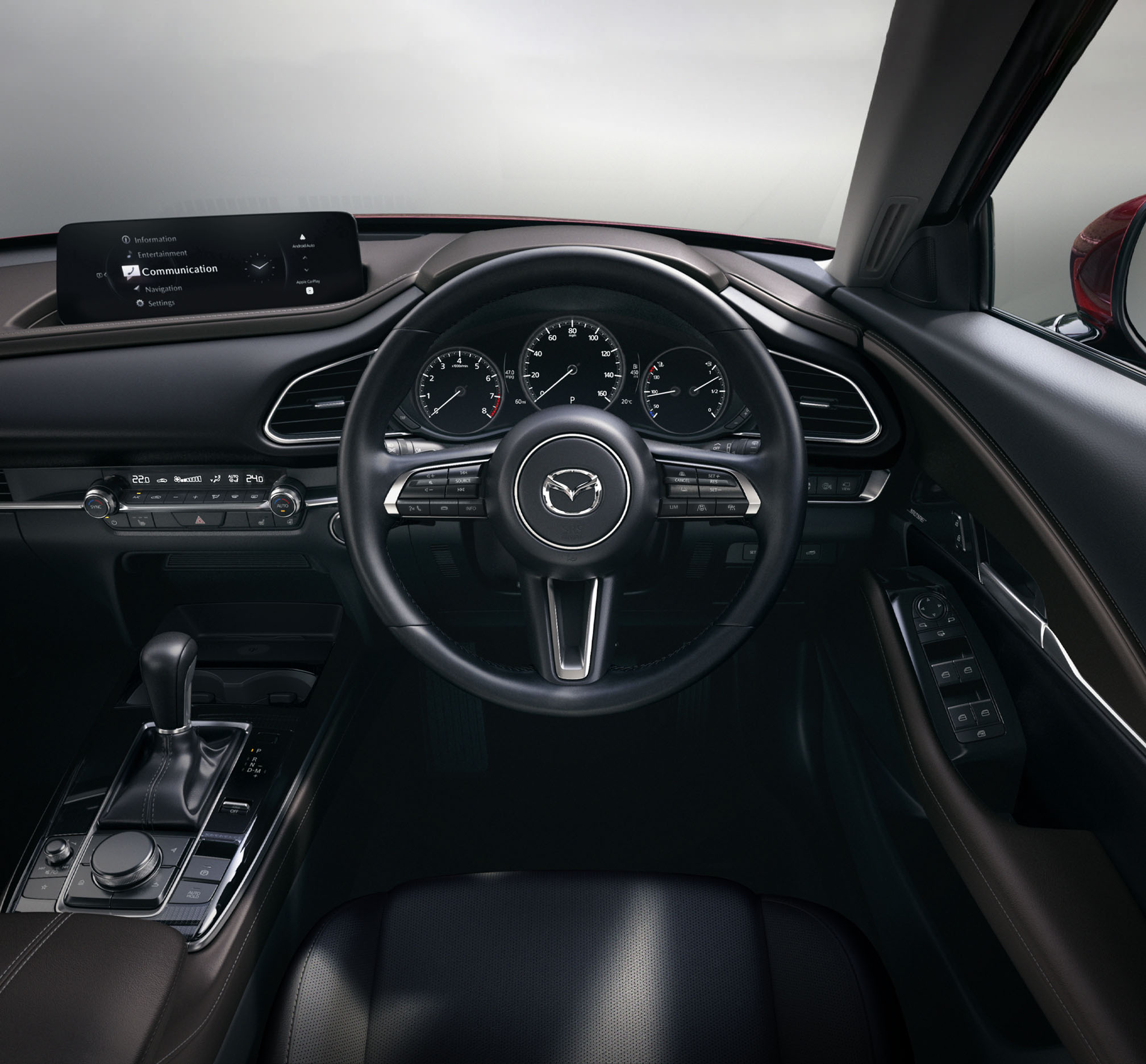 The steering wheel of the Mazda CX-30 with all its beautiful details.