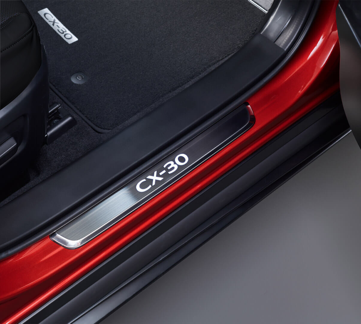 Stylish illuminated scuff plates for the Mazda CX-30.