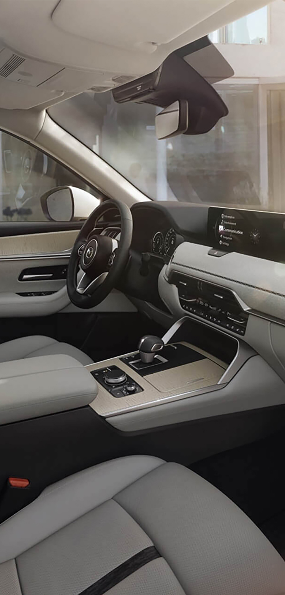 The roomy interior of the all-new Mazda CX-60 Plug-In Hybrid SUV featuring Japanese craftsmanship.