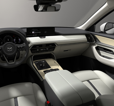Bílé kožené čalounění zcela nového plug-in hybridního SUV Mazda CX-60.