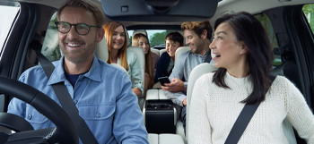 Six people sitting comfortably inside the spacious Mazda CX-80.