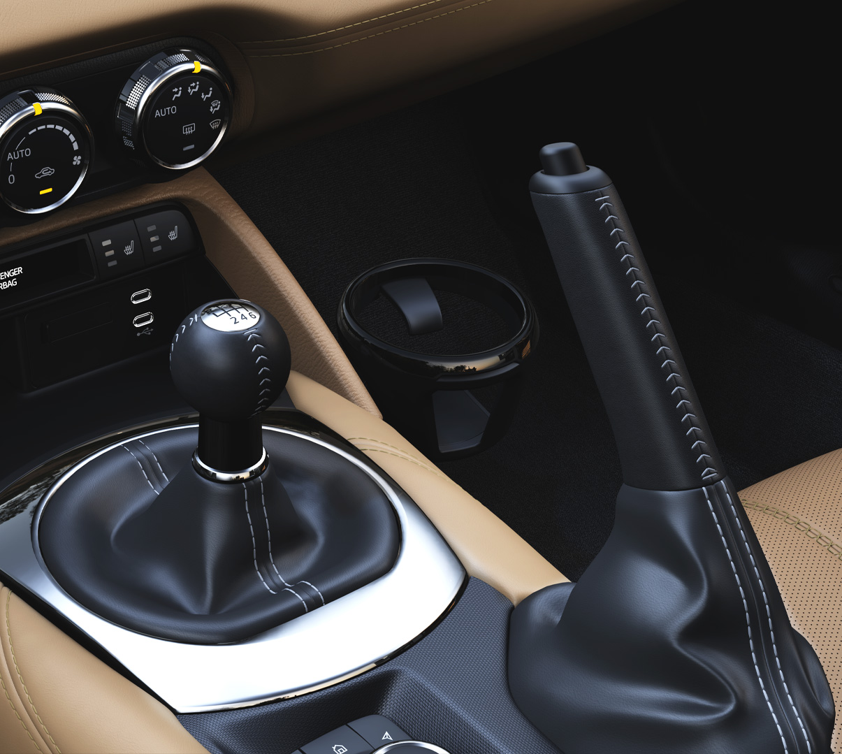 The standard leather covered shifter of the Mazda MX-5 Roadster.