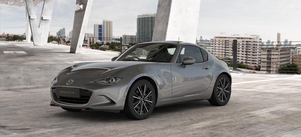 The Mazda MX-5 RF parked in an urban setting.