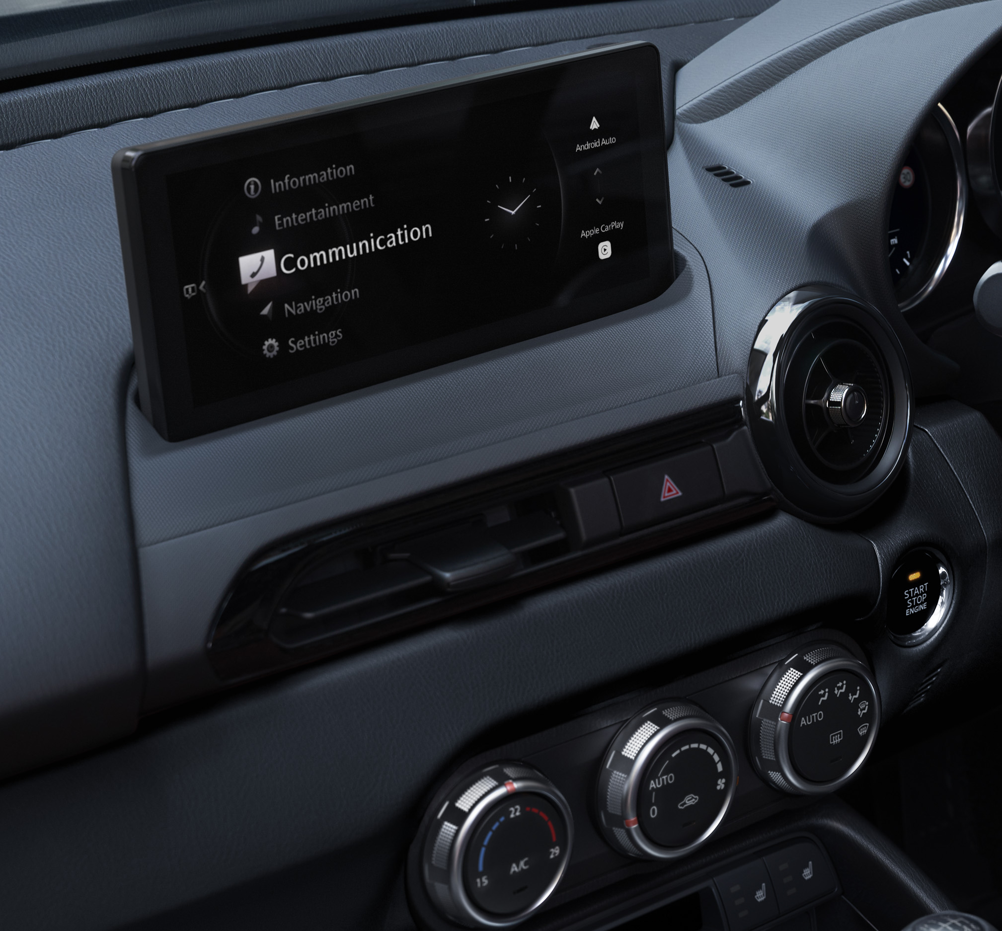 The interior of the Mazda MX-5
 Roadster and the new 8.8-inch centre touchscreen.