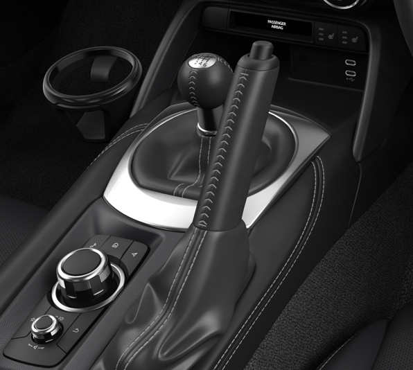 The standard leather covered shifter of the Mazda MX-5
 Roadster.