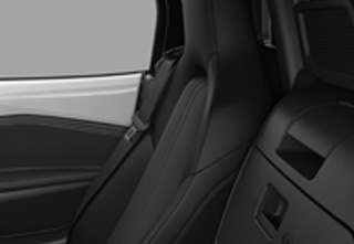 Seat material - (Side) Black cloth trim in the Mazda MX-5
 Roadster Prime-Line trim level