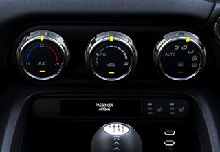 Manual A/C on the Mazda MX-5
 Roadster in the Prime-Line trim level