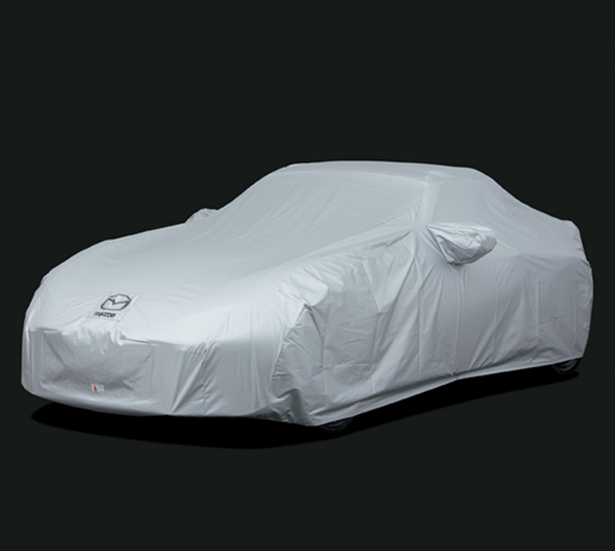 The Mazda MX-5
 RF covered with a white cover.