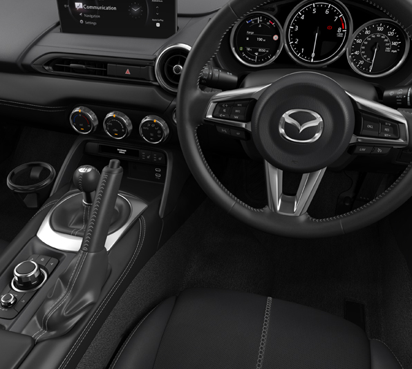 Interior of the Mazda MX-5
 Roadster and the steering wheel.