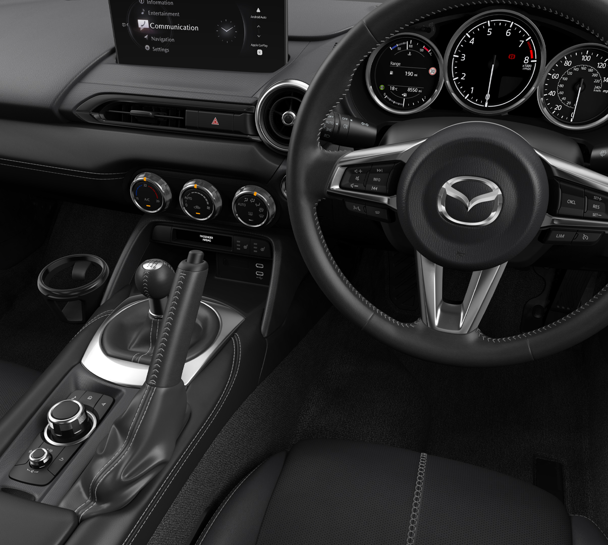 Interior of the Mazda MX-5
 Roadster and the steering wheel.