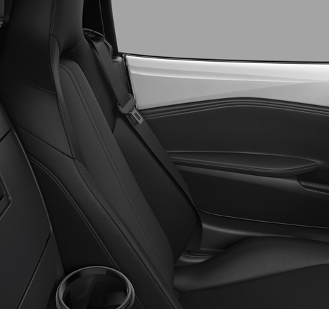 Asiento de tela negra del Mazda MX-5
 de capota.