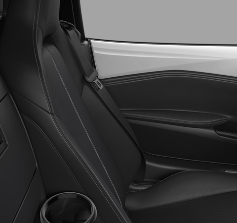 Stoelen van geperforeerd zwart leder van de Mazda MX-5
 softtop